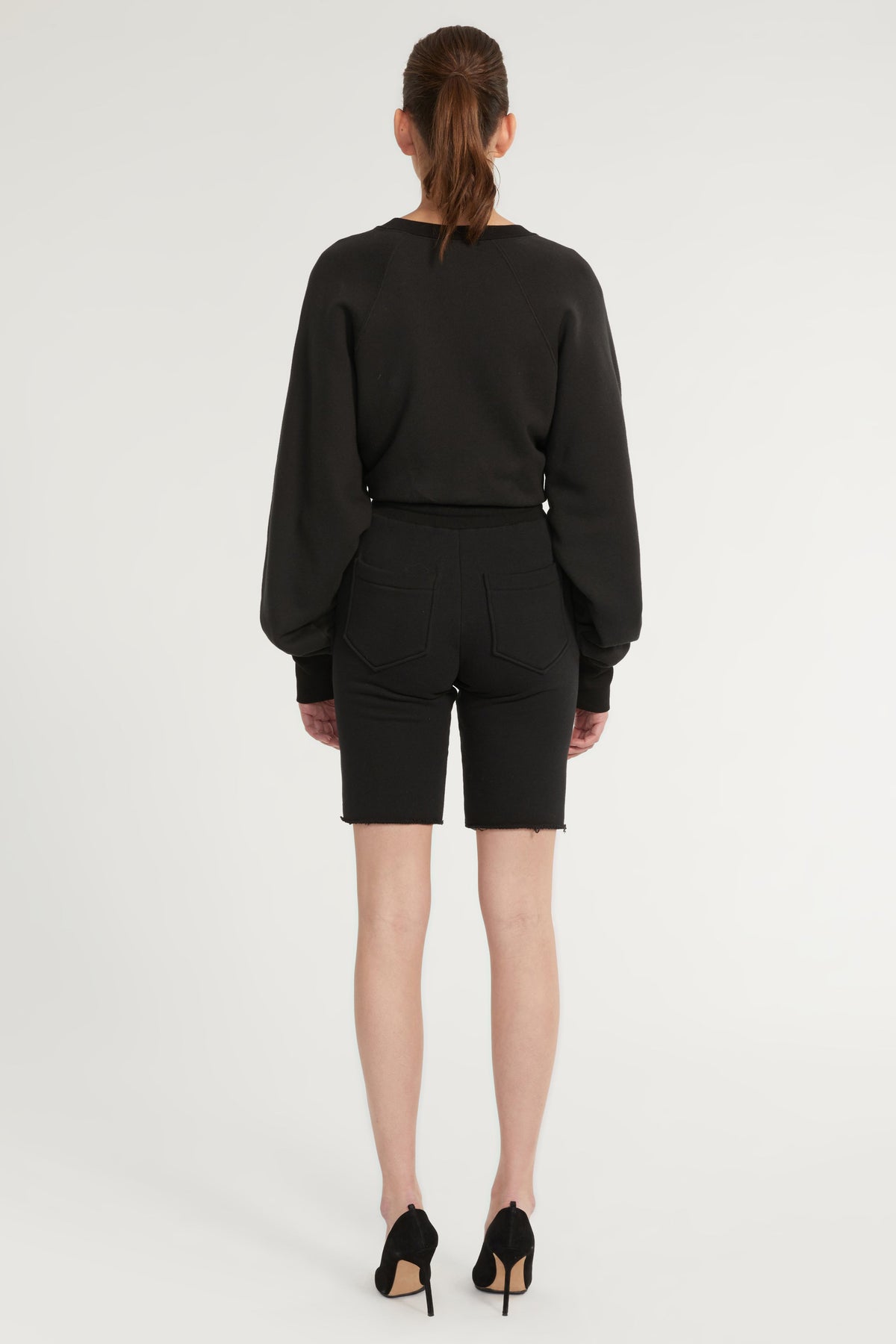 Romy Raw Edge French Terry Bermuda Short in Black