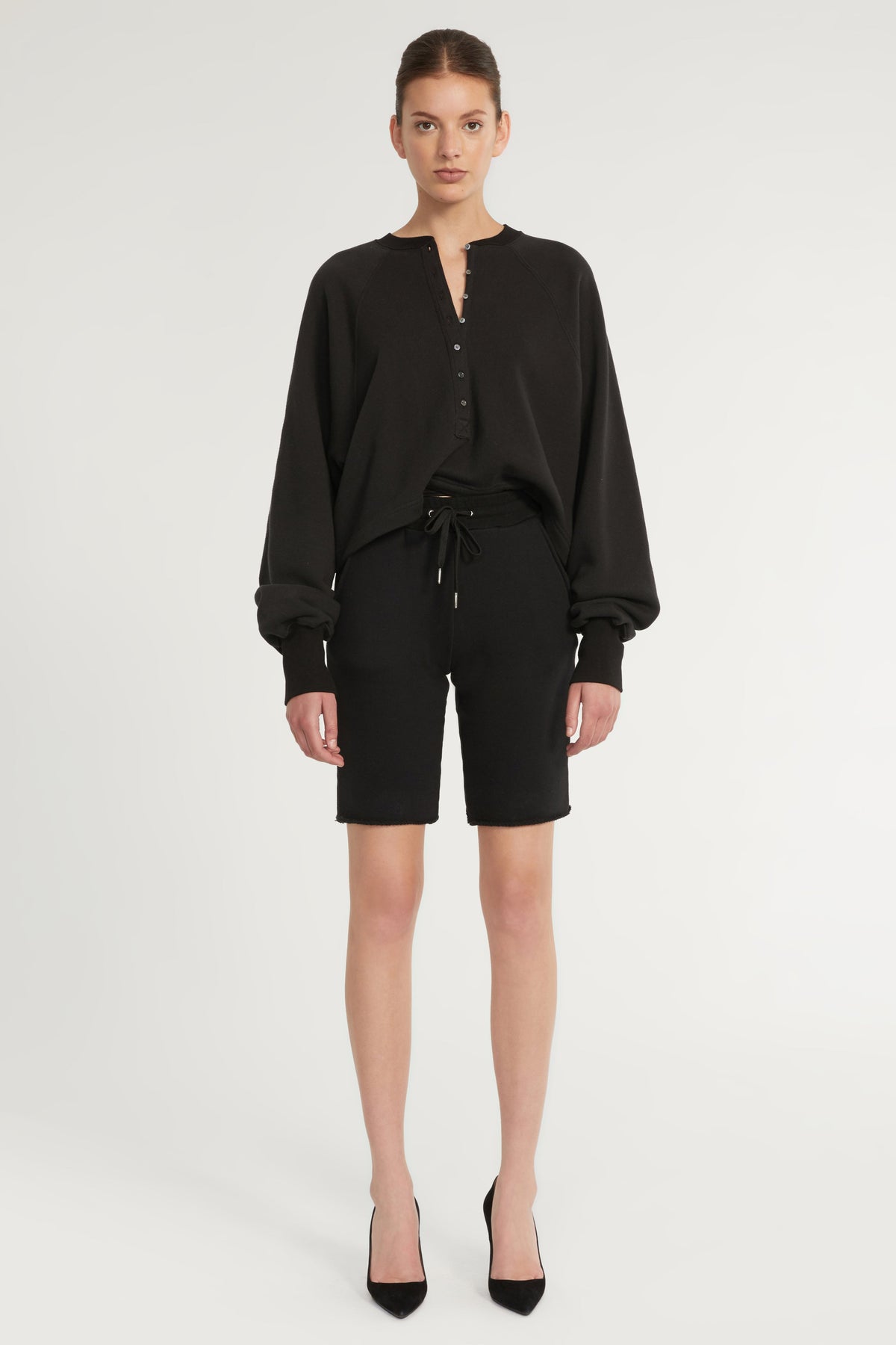 Romy Raw Edge French Terry Bermuda Short in Black